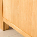 Side panel view of the Abbey Light Oak Blanket Box by Roseland Furniture