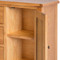 close up of the fixed cupboard shelf on the Surrey Oak 3 Drawer Sideboard by Roseland Furniture