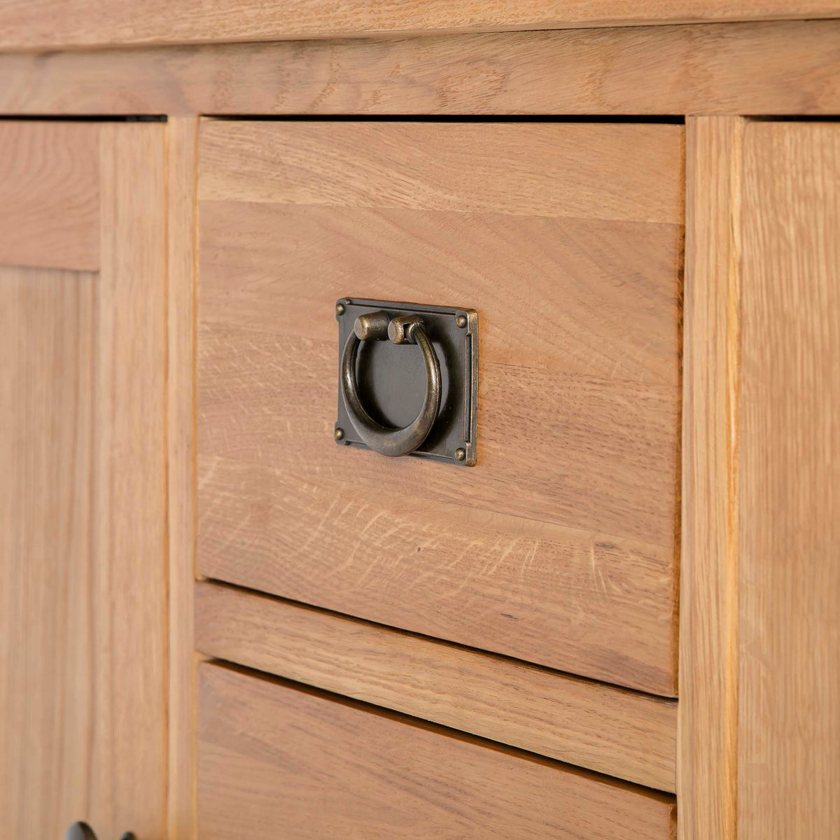 close up of top drawer on the Surrey Oak 3 Drawer Sideboard by Roseland Furniture