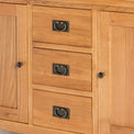 Close up of 3 drawers on the Surrey Oak 3 Drawer Sideboard by Roseland Furniture