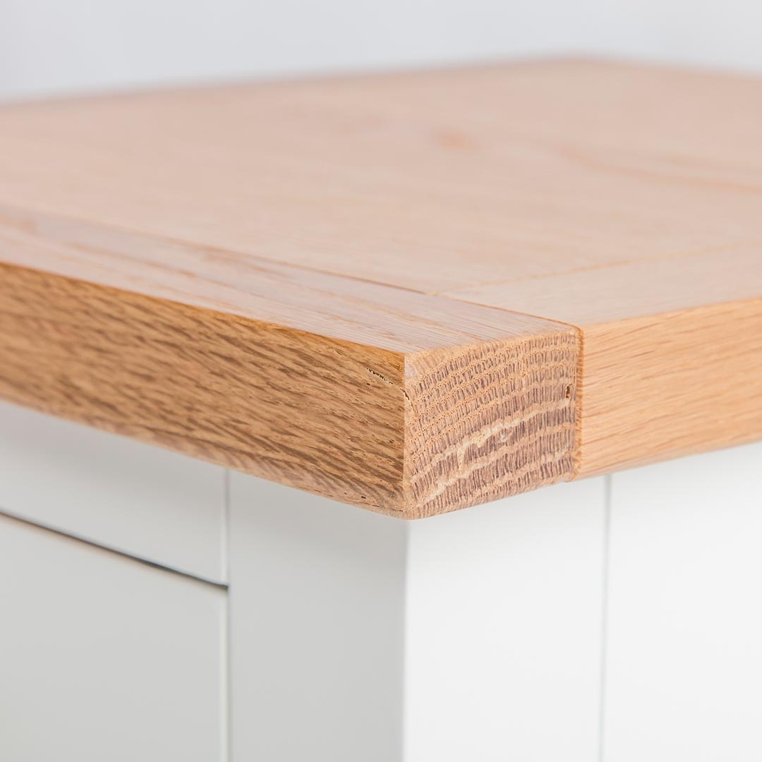 close up of the oak top corner on the Farrow White Lamp Table 