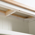 under view of the oak top on the Farrow White Low Bookcase 