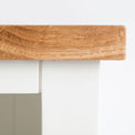 close up of the oak top edge on the Farrow White Low Bookcase 