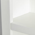 Close up of the white wooden frame on the Farrow White Large Bookcase