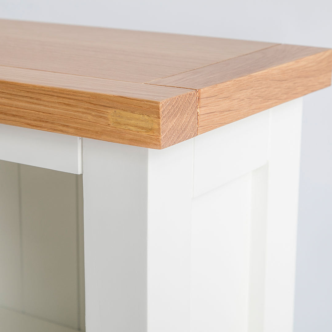 Close up of the oak top on the Farrow White Narrow Bookcase