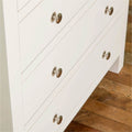 Farrow White 2 Over 3 Chest Of Drawers from Roseland Furniture - close up of drawers