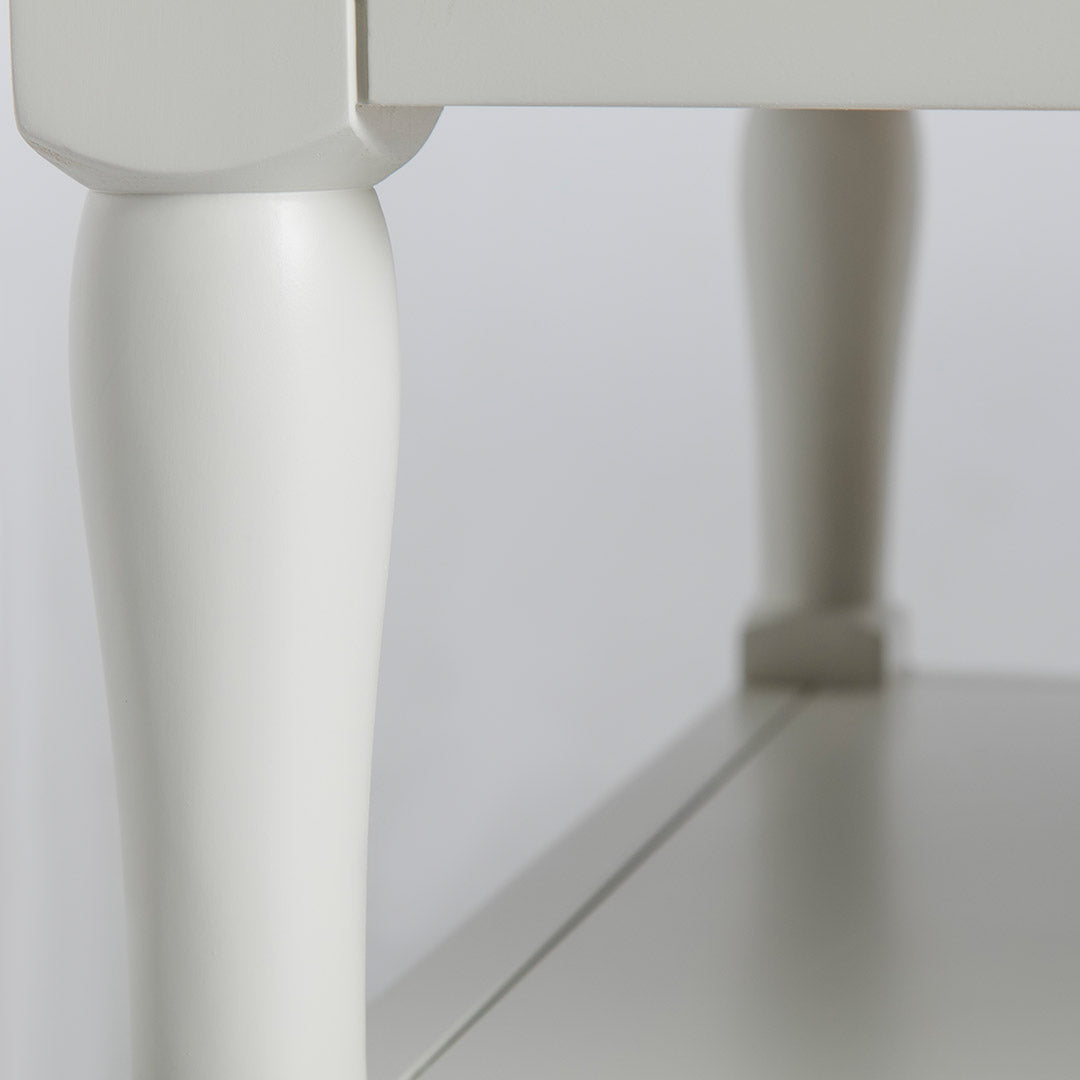 Close up of the curved legs on the Chichester Ivory Coffee Table