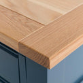 Close up of the oak top corner on the Chichester Stiffkey Blue Coffee Table