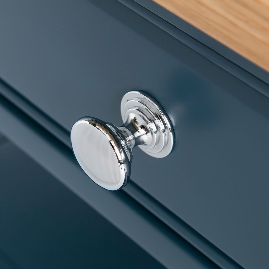 Close up of the round metal handle on the Chichester Stiffkey Blue Coffee Table