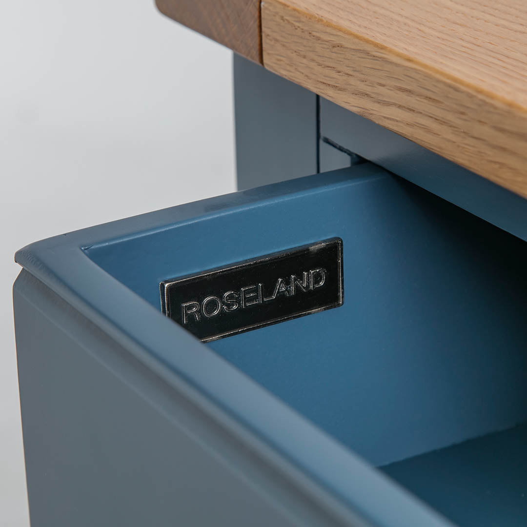 Close up of the metal Roseland label on the Chichester Stiffkey Blue Coffee Table