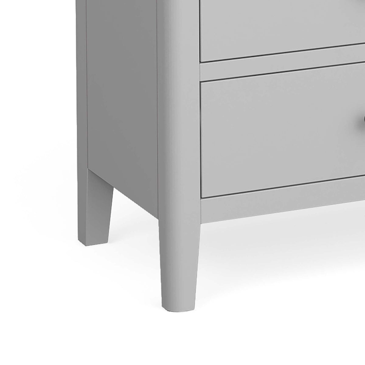 close up of tapered legs on the Elgin Grey 3 over 3 Chest of Drawers