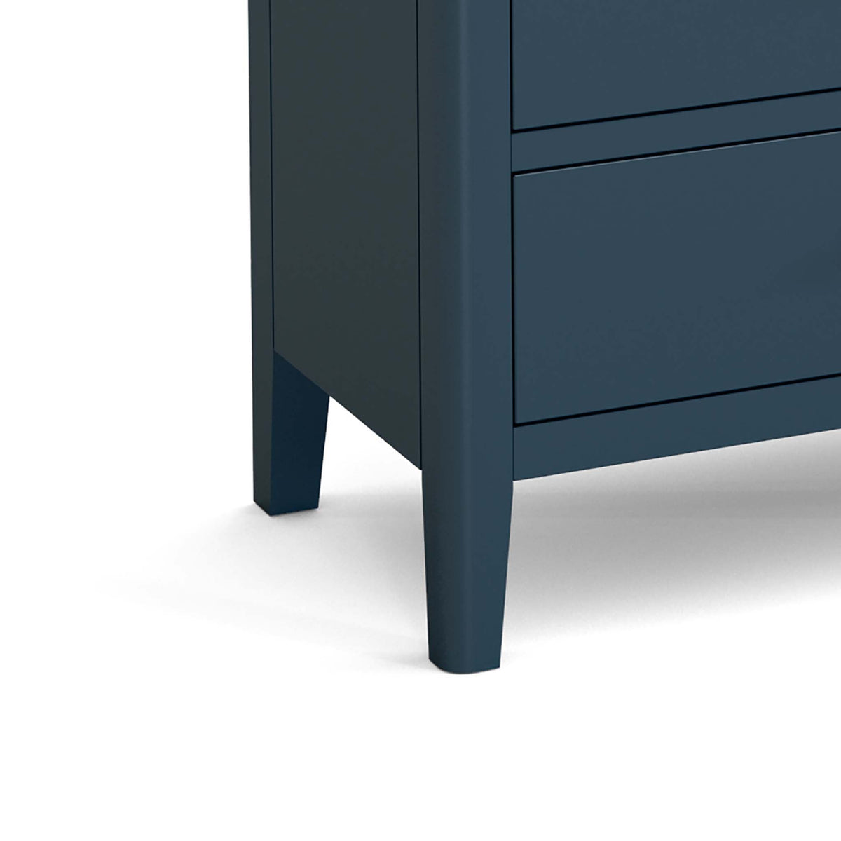 close up of tapered legs on the Stirling Blue 3 over 3 Chest of Drawers
