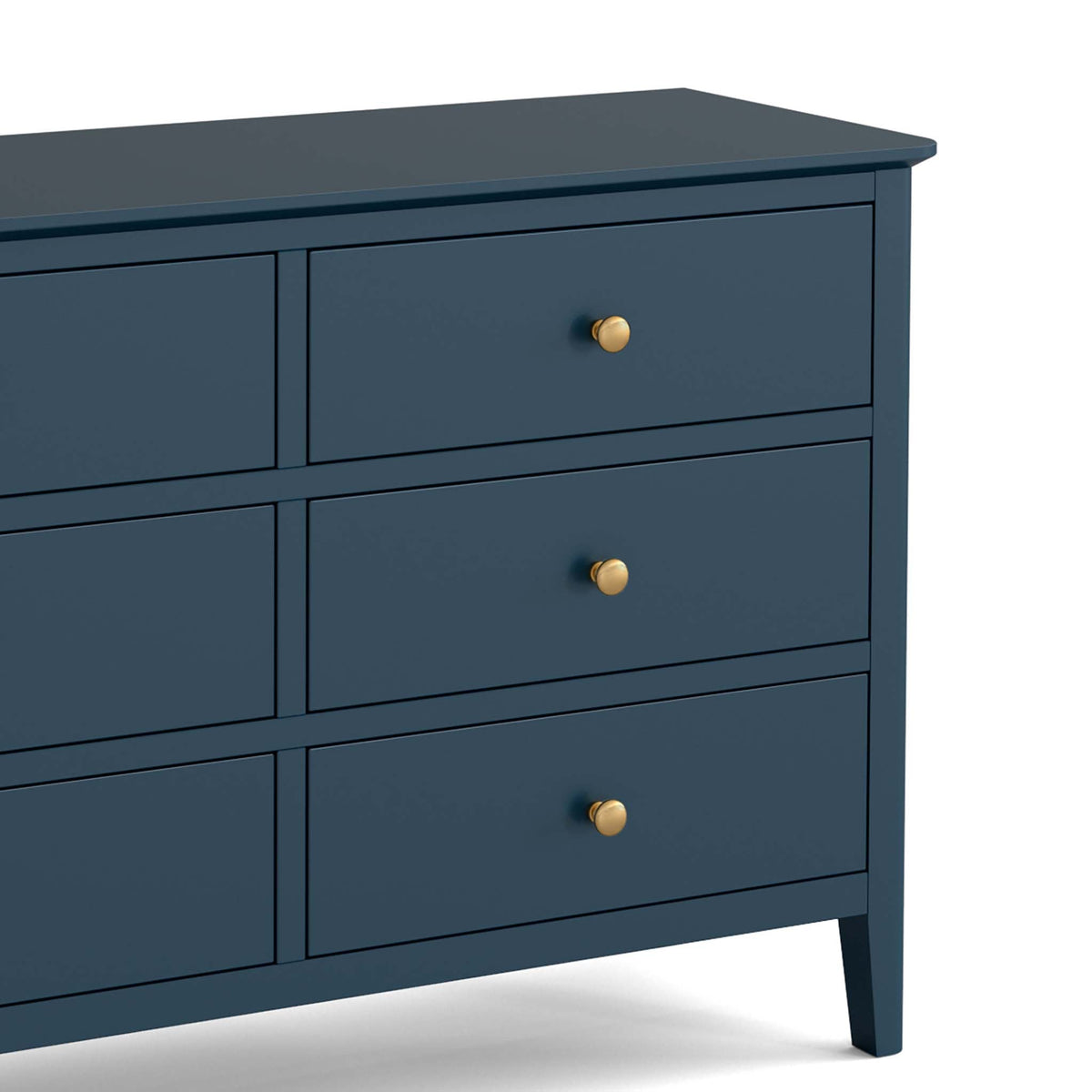 close up of gold handles on the Stirling Blue 3 over 3 Chest of Drawers