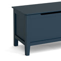 close up of sleek top edge and tapered legs on the Stirling Blue Blanket Box Storage Chest