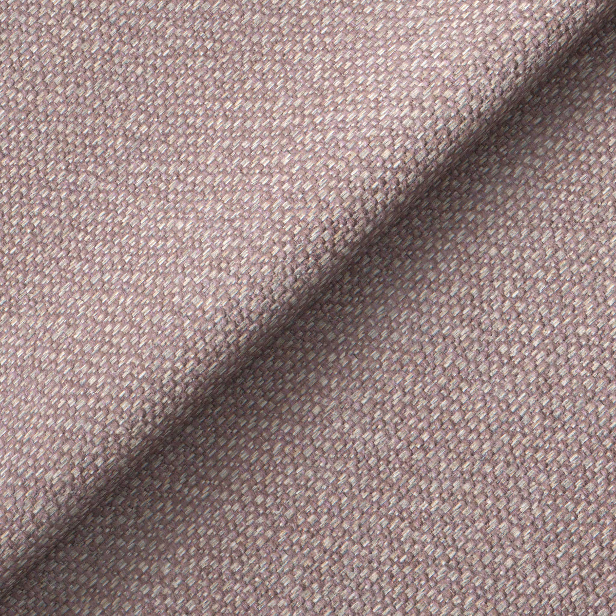 Textured fabric draped and folded diagonally, creating a shadow at the fold. The context is a close-up view, emphasizing the weave and texture.
