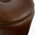 Manta Vintage Brown Round Leather Bar Stool close up of stitched leather stool