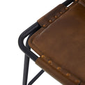 Elgin Brown Leather Breakfast Bar Stool close up of strapped seat with antiqued bronze buttons