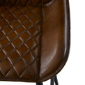 Rex Brown Quilted Leather Breakfast Bar Stool close up of flared seat