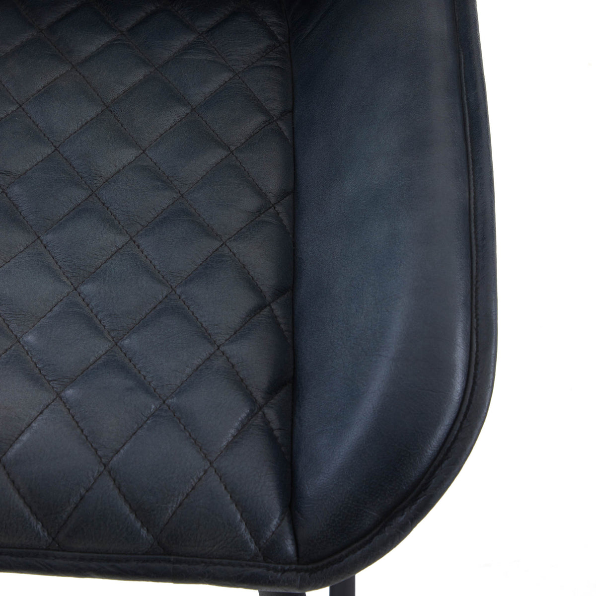 Rex Grey Quilted Leather Breakfast Bar Stool close up of flared seat 