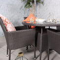 Malaga 4 Seat Deluxe Stacking 110cm Rattan Dining Set Lifestyle closeup