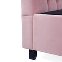 Francis Blush Velvet Ottoman Storage Bed close up of wooden legs