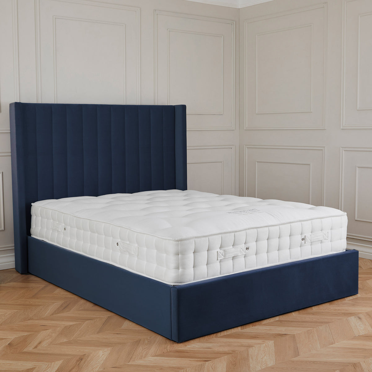 Maude Navy Velvet Ottoman Storage Bed Frame from Roseland Furniture