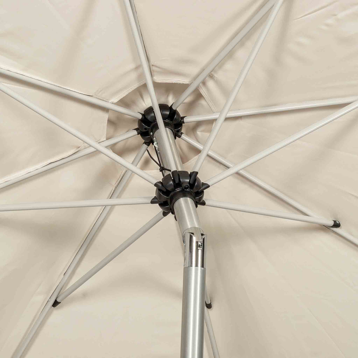close up of the tilting mechanism on the 3m Crank & Tilt Ivory Garden Parasol with Brushed Aluminium Frame