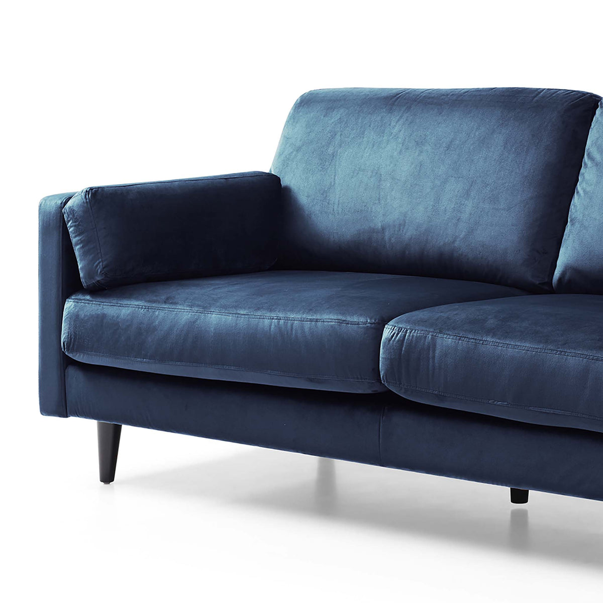 close up of the pocket sprung seats on the Elsdon Blue Ink 3 Seater Velvet Sofa