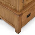 Zelah Oak Triple Wardrobe with Drawers - Close up of foot of wardrobe