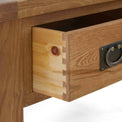 Zelah Oak Coffee Table with Drawer - Close up of dovetail joints on drawer