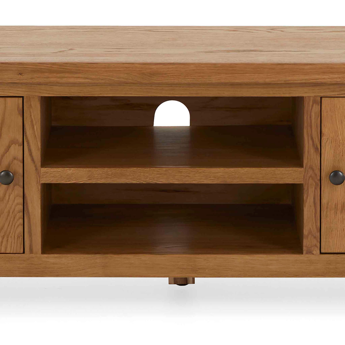 Zelah Oak 150cm TV Stand - Close up of middle shelving and cable access holes