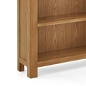 Zelah Oak Large Bookcase - Close up of base of bookcase