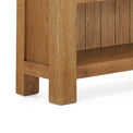 Zelah Oak Small Bookcase - Close up of feet of bookcase
