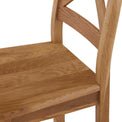 Zelah Oak Crossed-Back Dining Chair - Close up of crossed back and seat on chair