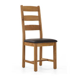 Wooden chair with ladder back and dark brown cushioned seat.
