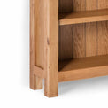 Surrey Oak Slim Bookcase - Close up of base and feet of bookcase