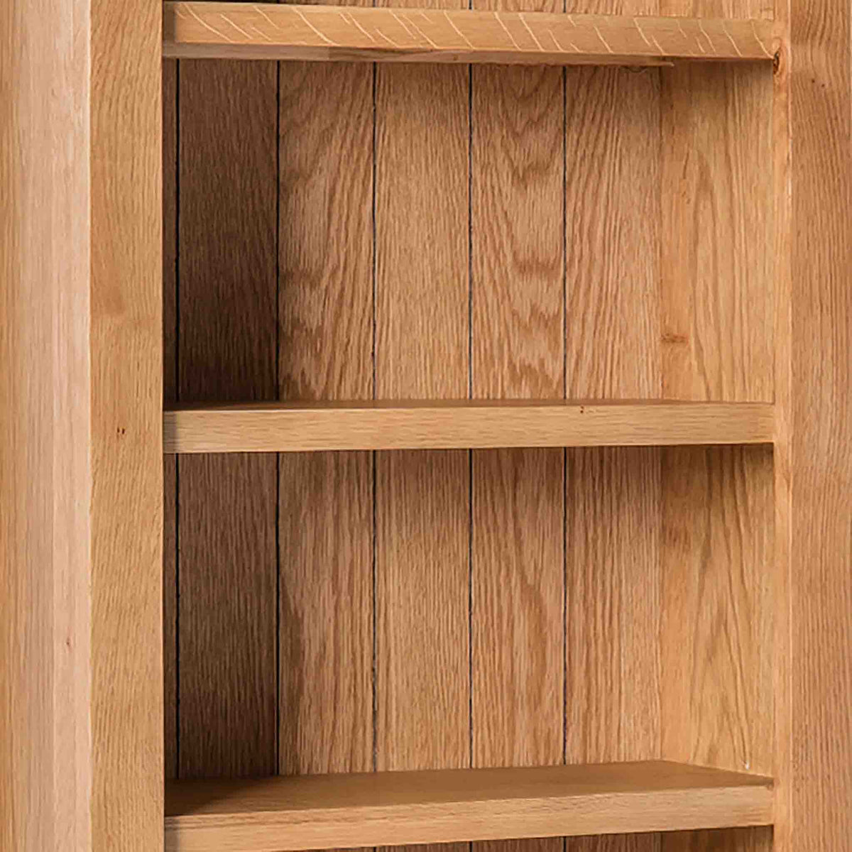 Surrey Oak Slim Bookcase - Close up of shelves  side view