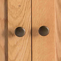 Surrey Oak Small Cupboard - Close up of cupboard door knobs