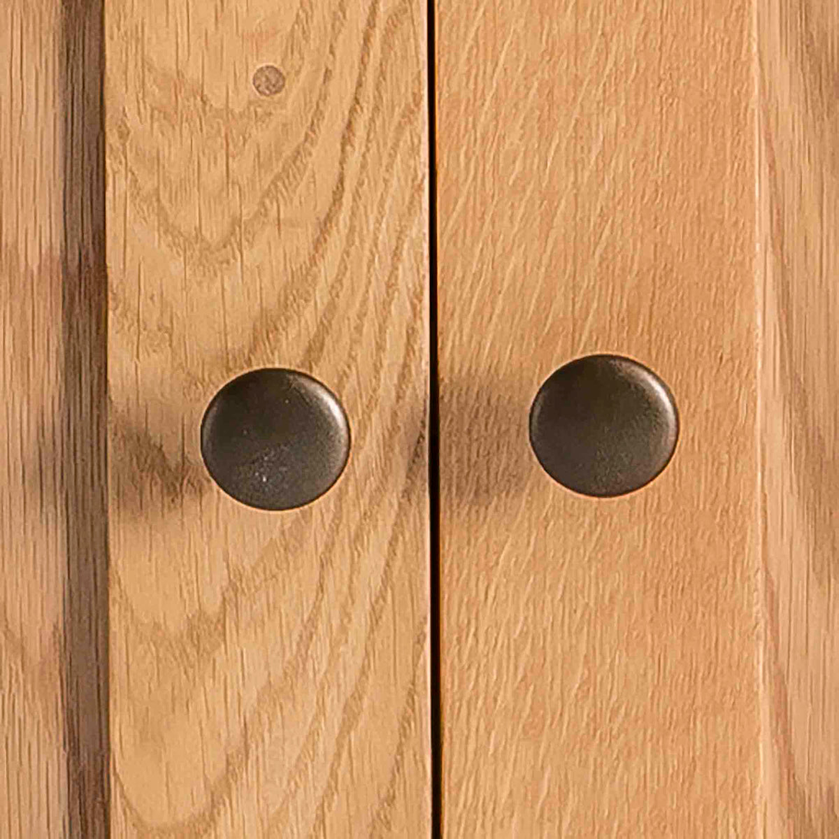 Surrey Oak Small Cupboard - Close up of cupboard door knobs