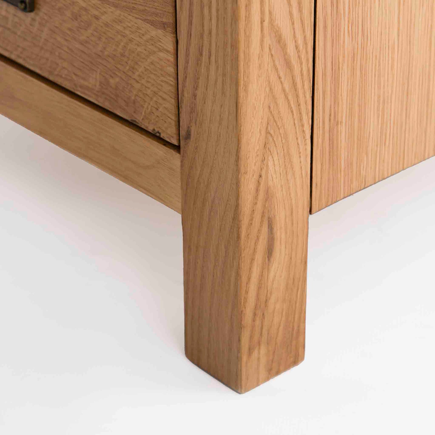 Surrey Oak Bedside Table - Close up of foot of bedside