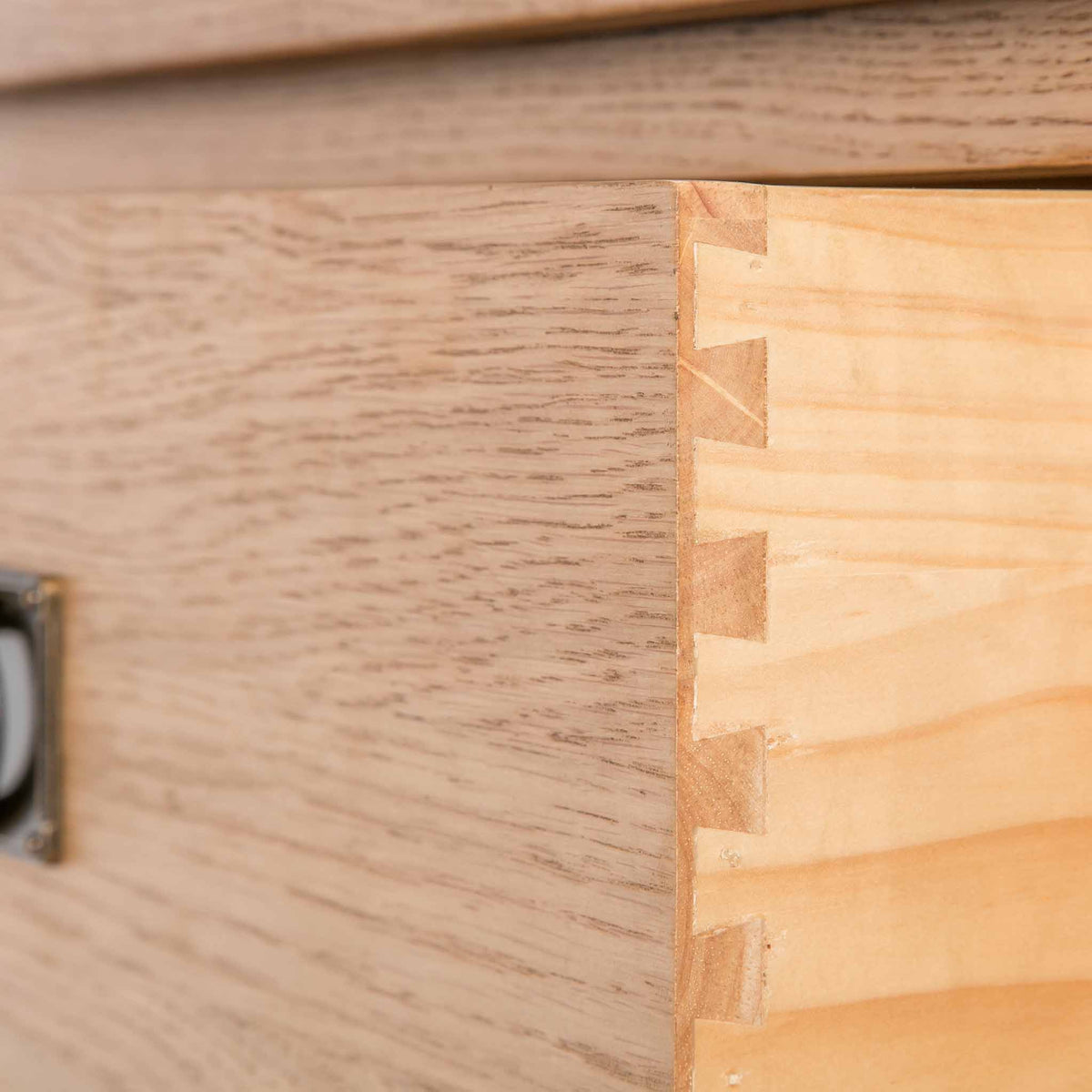 close up of dovetail joints for the Surrey Oak Large Chest Of Drawers
