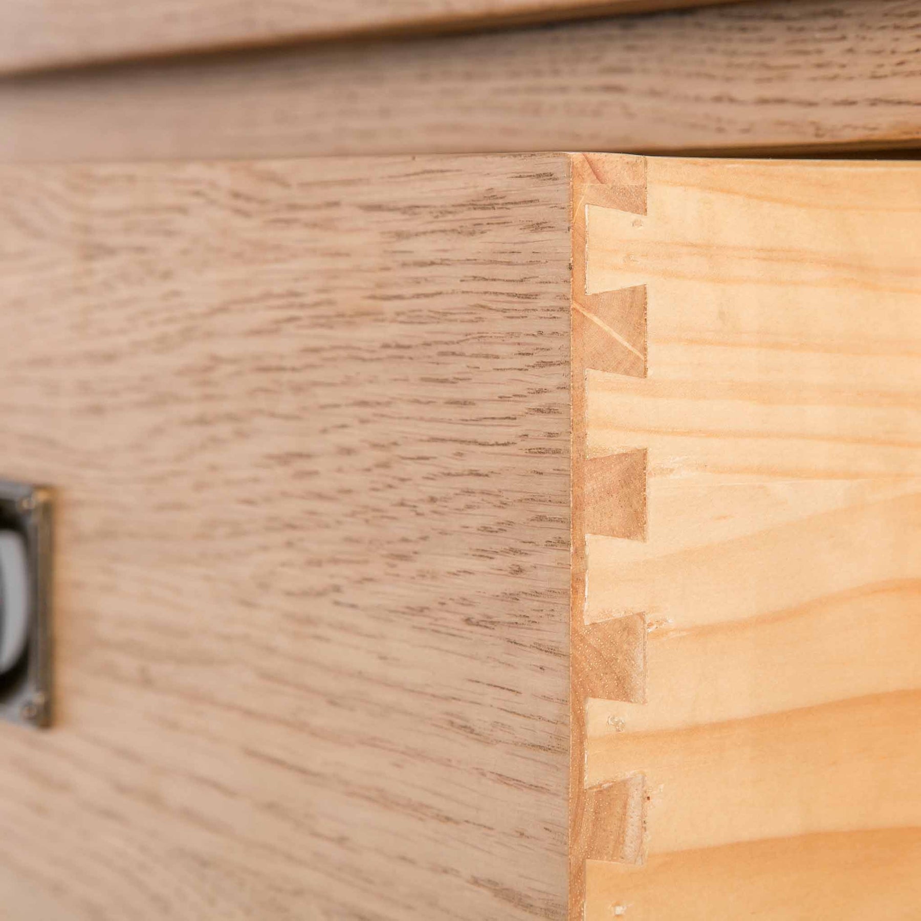 close up of dovetail joints for the Surrey Oak Large Chest Of Drawers
