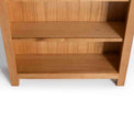 London Oak Large Bookcase - Close up of bottom shelving on bookcase