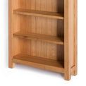 London Oak Large Bookcase - Close up of bottom shelving on bookcase