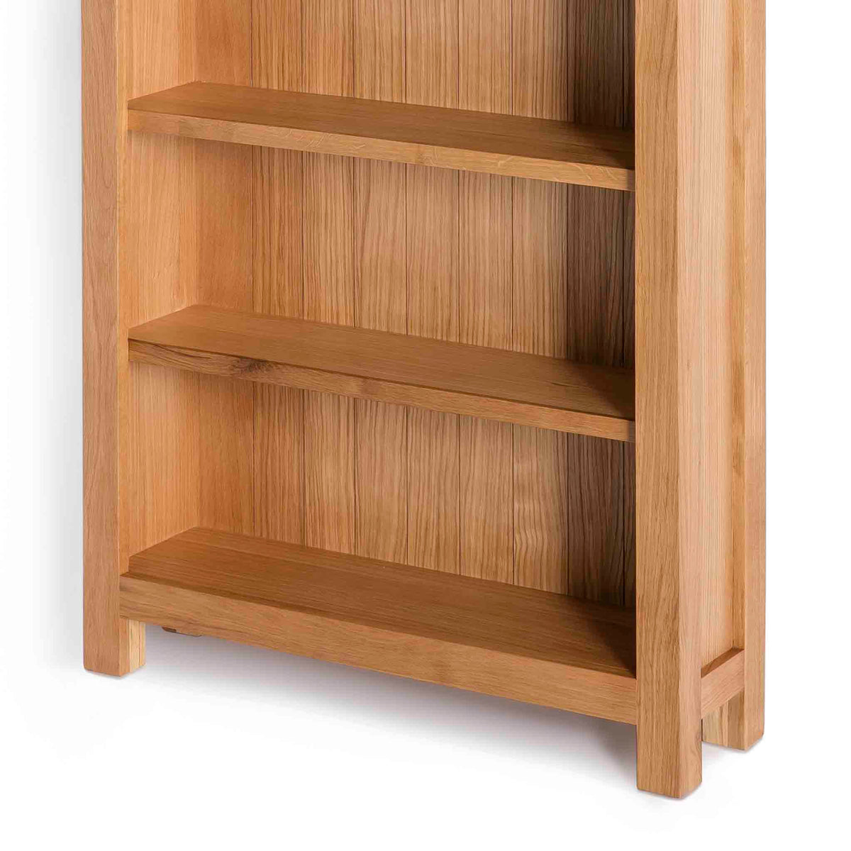 London Oak Large Bookcase - Close up of bottom shelving on bookcase