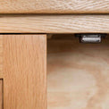 close up of the magnetic door catch on the The London Oak Cupboard