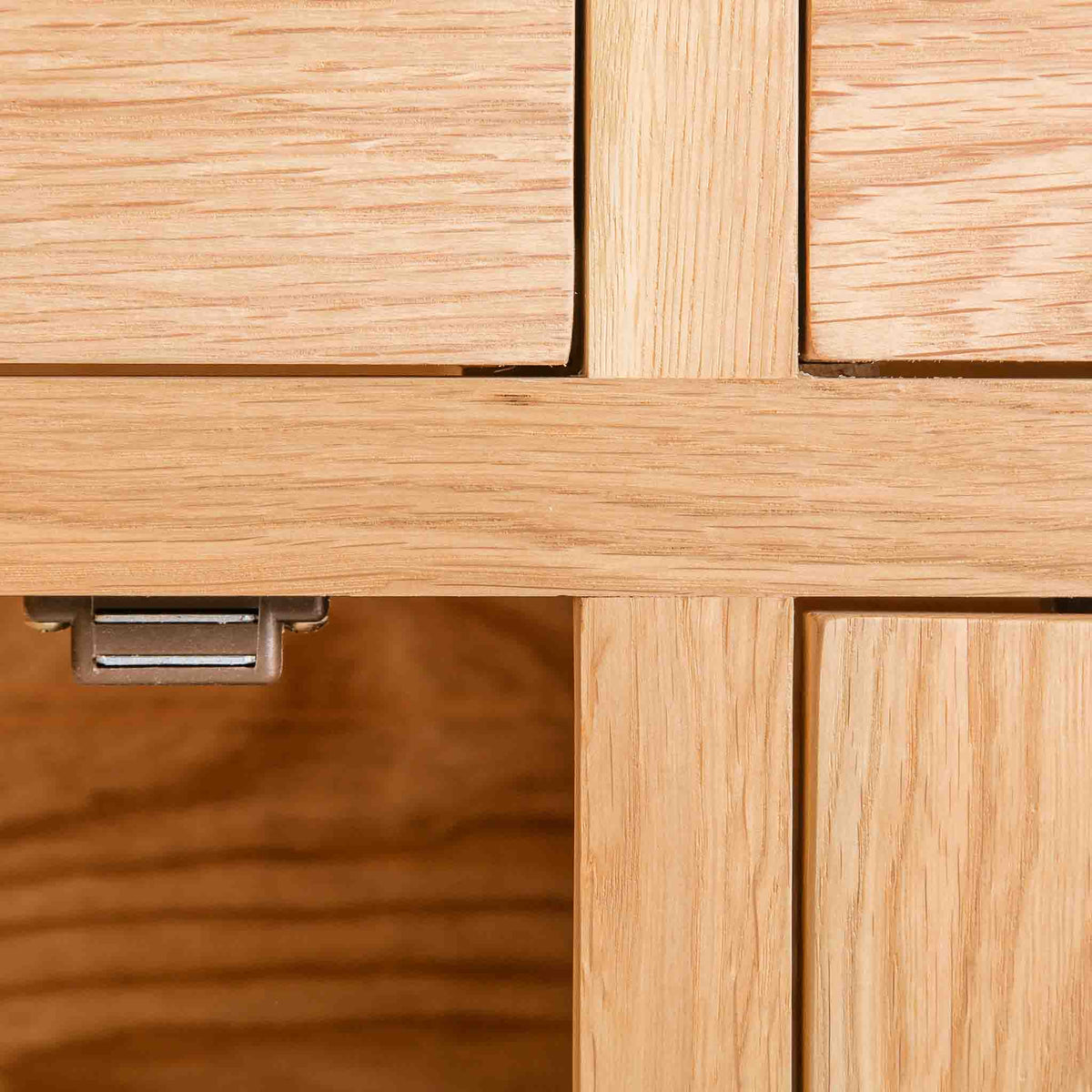 close up of solid wood frame and magnetic door lock on London Oak Large Sideboard