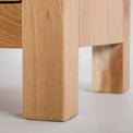 close up of solid oak legs on the London Oak 2 over 3 Chest of Drawers