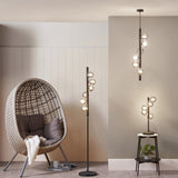 Blair Smoked Glass Ball and Black Metal Floor Lamp lifestyle