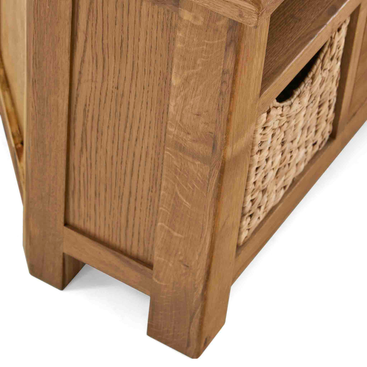 Zelah Oak Corner TV Stand with Baskets - Side of stand